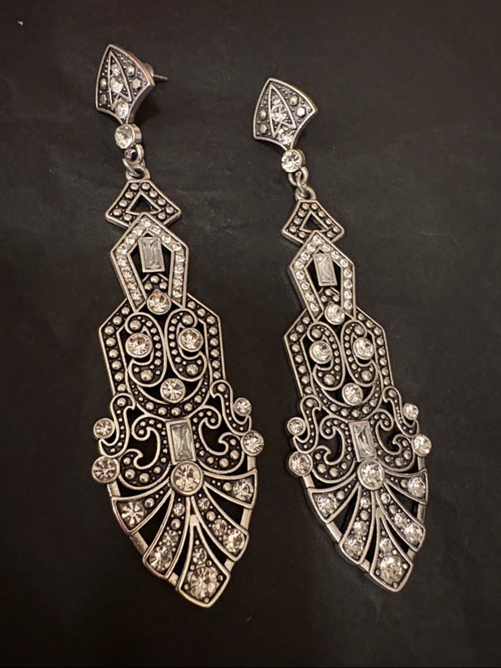 Art deco style post back earrings with crystals in Silvertone